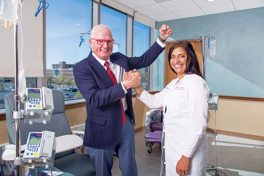 WILLIAM POOLE CELEBRATES VICTORY OVER CANCER WITH DR. SUSANNA ULAHANNAN, WHO HELPED SAVE HIS LIFE THROUGH A CLINICAL TRIAL.