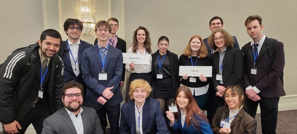 OU Model UN students posing for a picture at the regional conference.