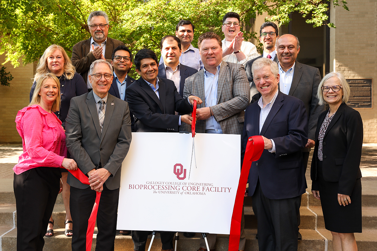 OU faculty and staff official open the bioprocessing core facility with a ribbon cutting on May 23, 2025.