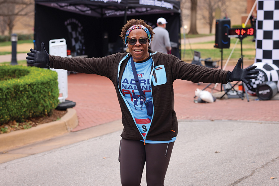 A women crossing the finish line.