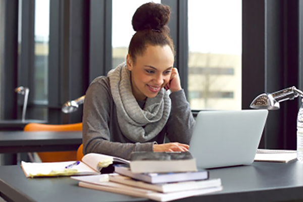 Student looking at a laptop