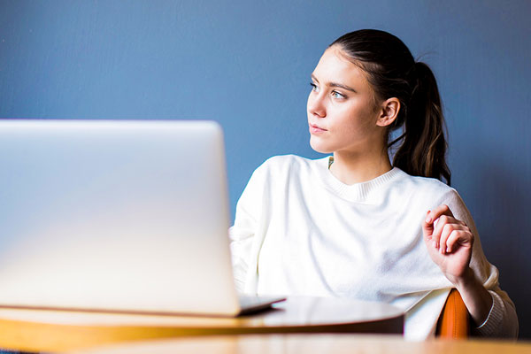 College student working on a computer