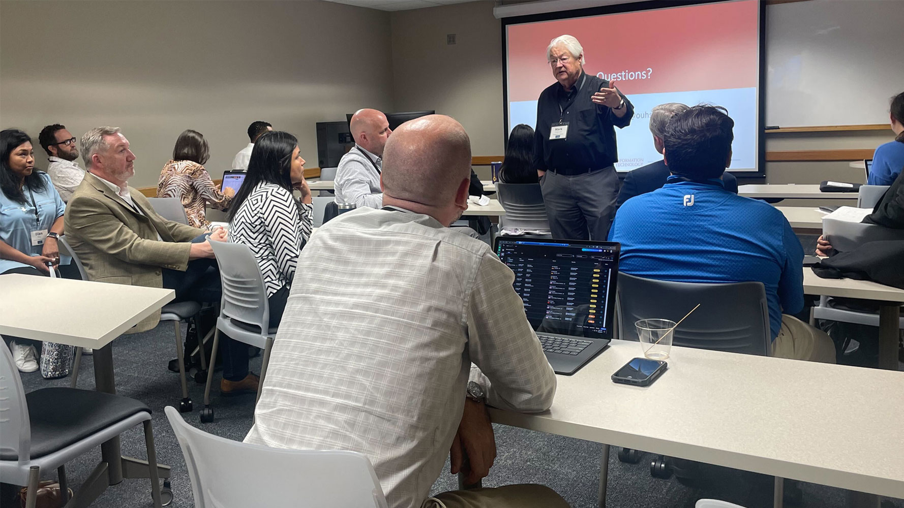 OU Enterprise IT Governance Director, Mark Ferguson, talks to a group about IT Governance at the 2023 Council on Information Technology Summit.