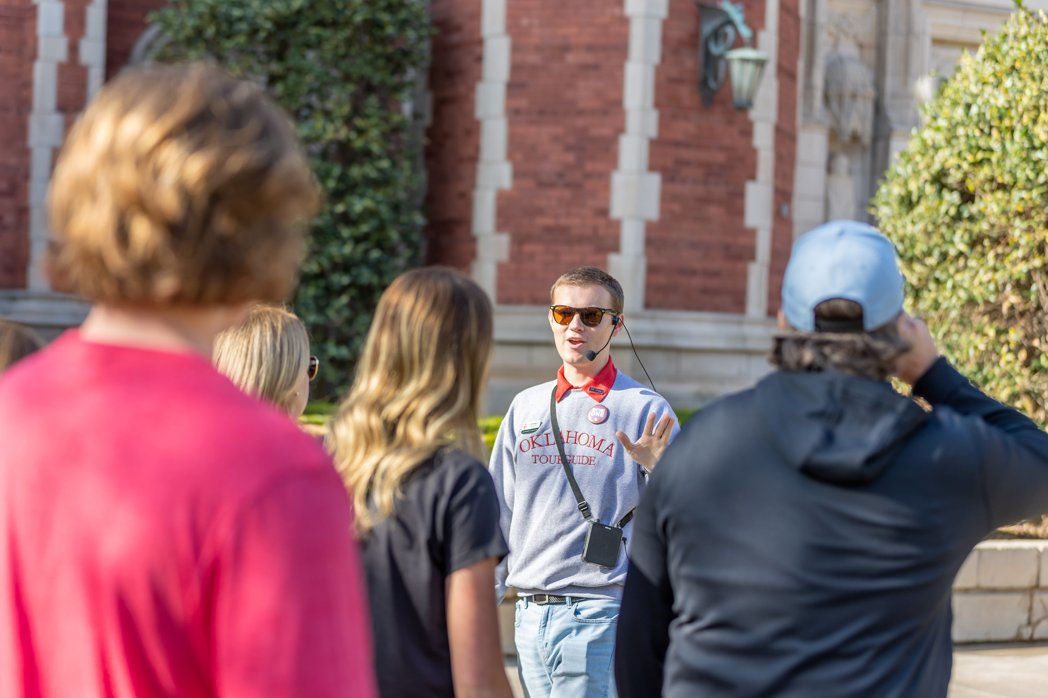 Tour guide speaking with prospective students