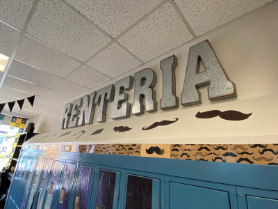 Renteria letter sign on the wall of his classroom