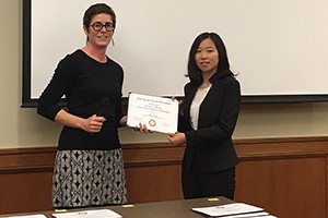 Qian Wang receiving award