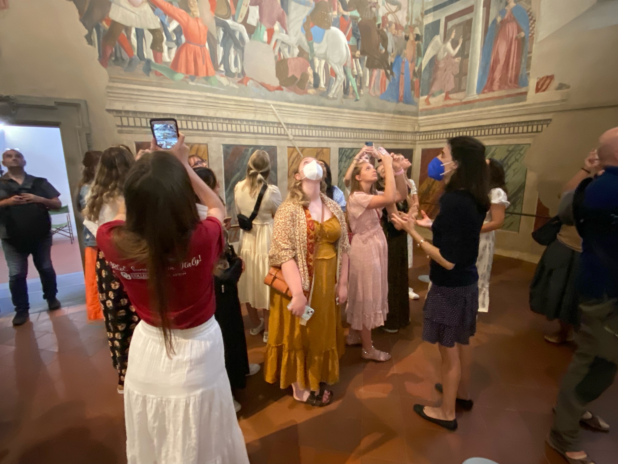 Students looking at frescoes