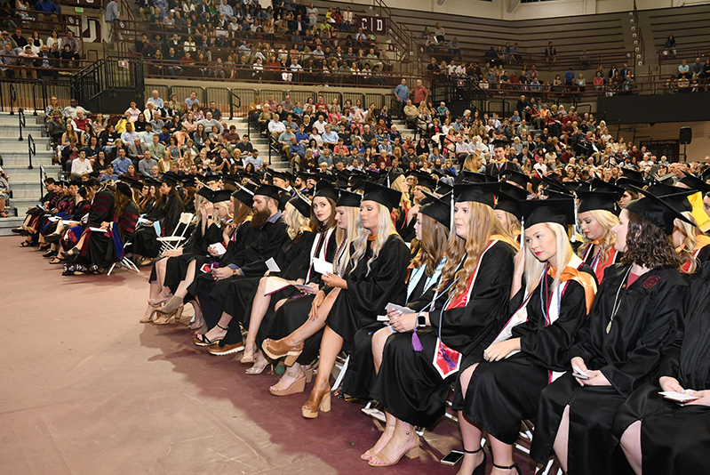 Students sitting at graduation ceremony