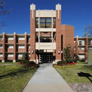 A picture of the front of Collings Hall with the bell tower