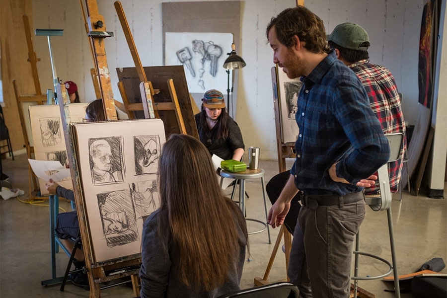 Associate Professor of Painting Jason Cytacki instructing students in the OU School of Visual Arts.