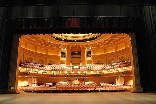 View of the seats in historic Holmberg Hall from stage center in Donald W. Reynolds Performing Arts Center