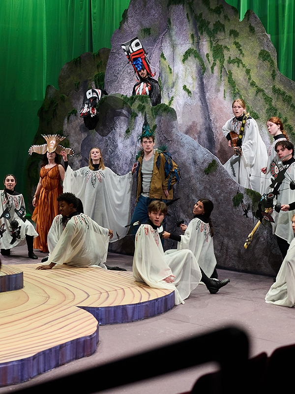 An ensemble of drama students performing "The Birds."