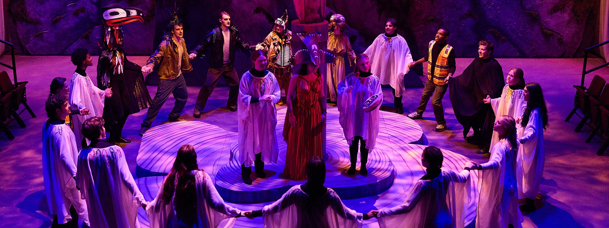 An ensemble of drama students performing "The Birds."
