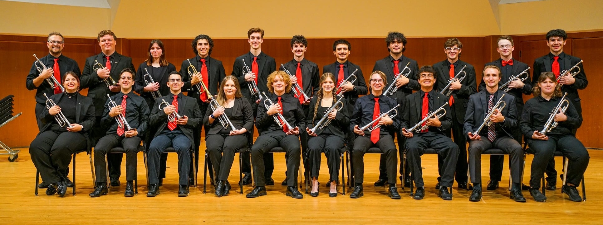 OU Trumpet studio posed in sharp hall with Dr. Lindsey.