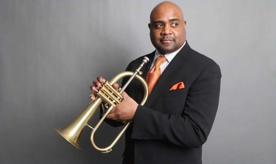 Terrell Stafford holding flugelhorn.