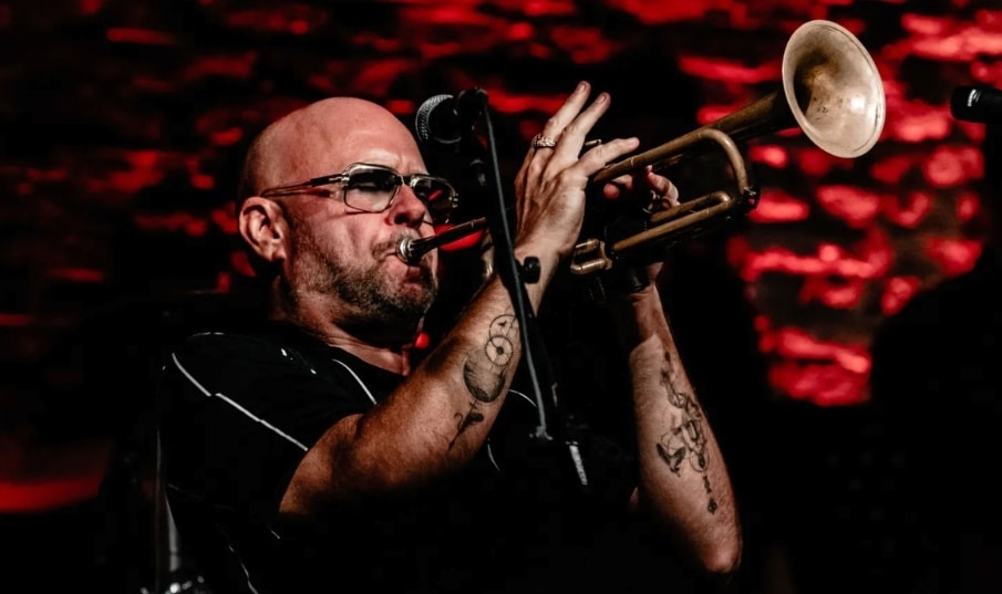 Philip Lassiter performing on stage.