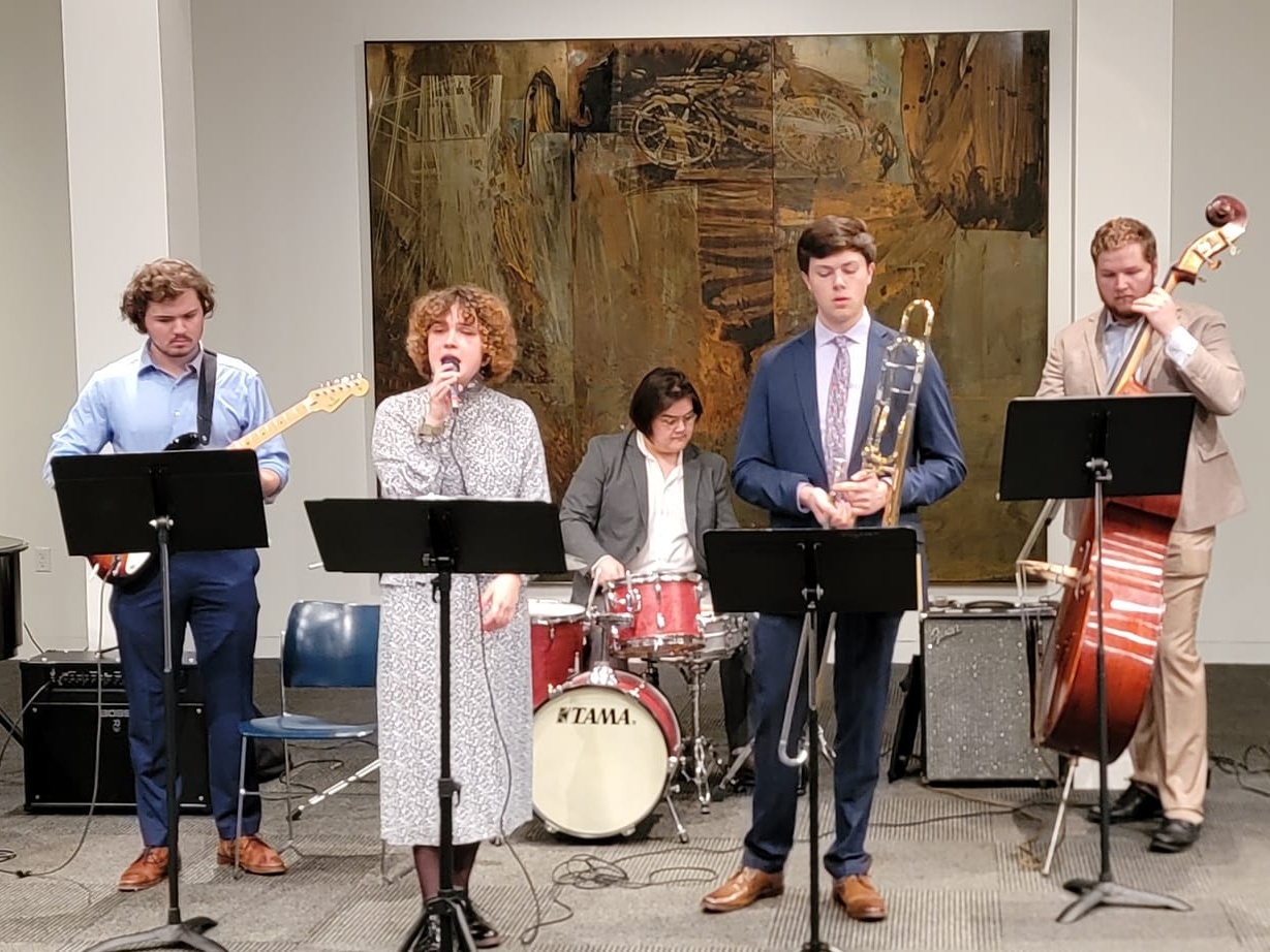 Jazz combo performing at Fred Jones Jr. Museum of Art.