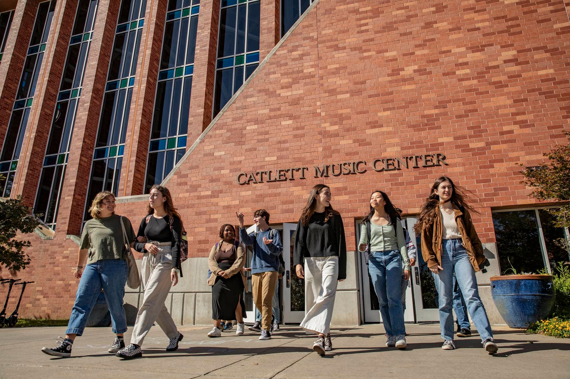 Undergraduate students in front of the Catlett Music Center main entrance.