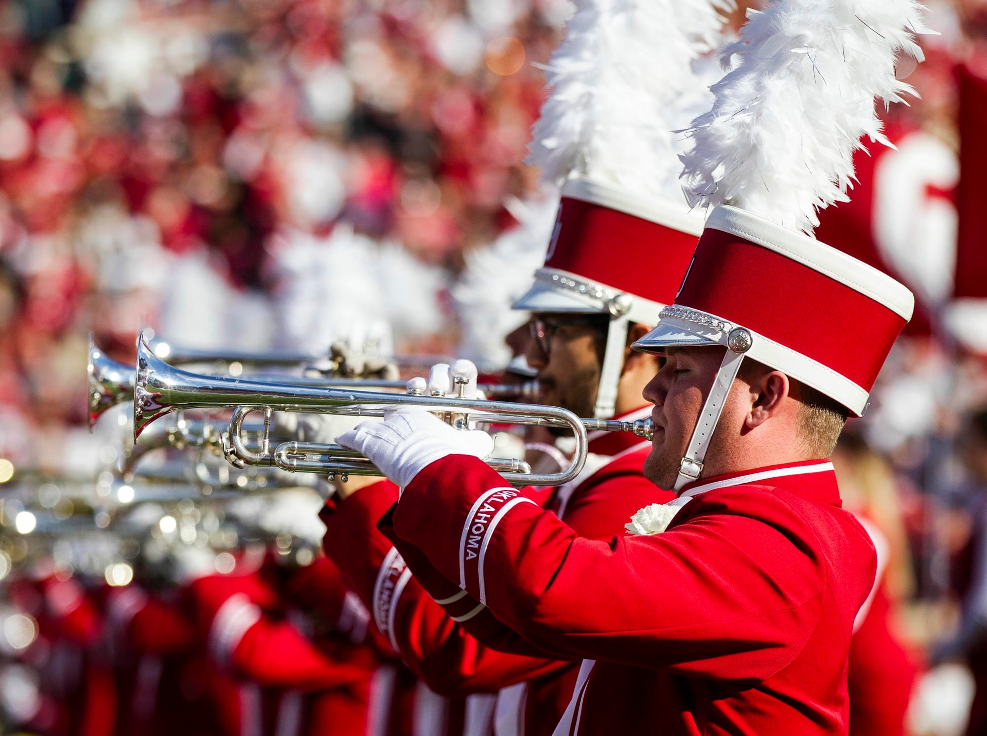 The Pride of Oklahoma trumpet section during halftime performance.