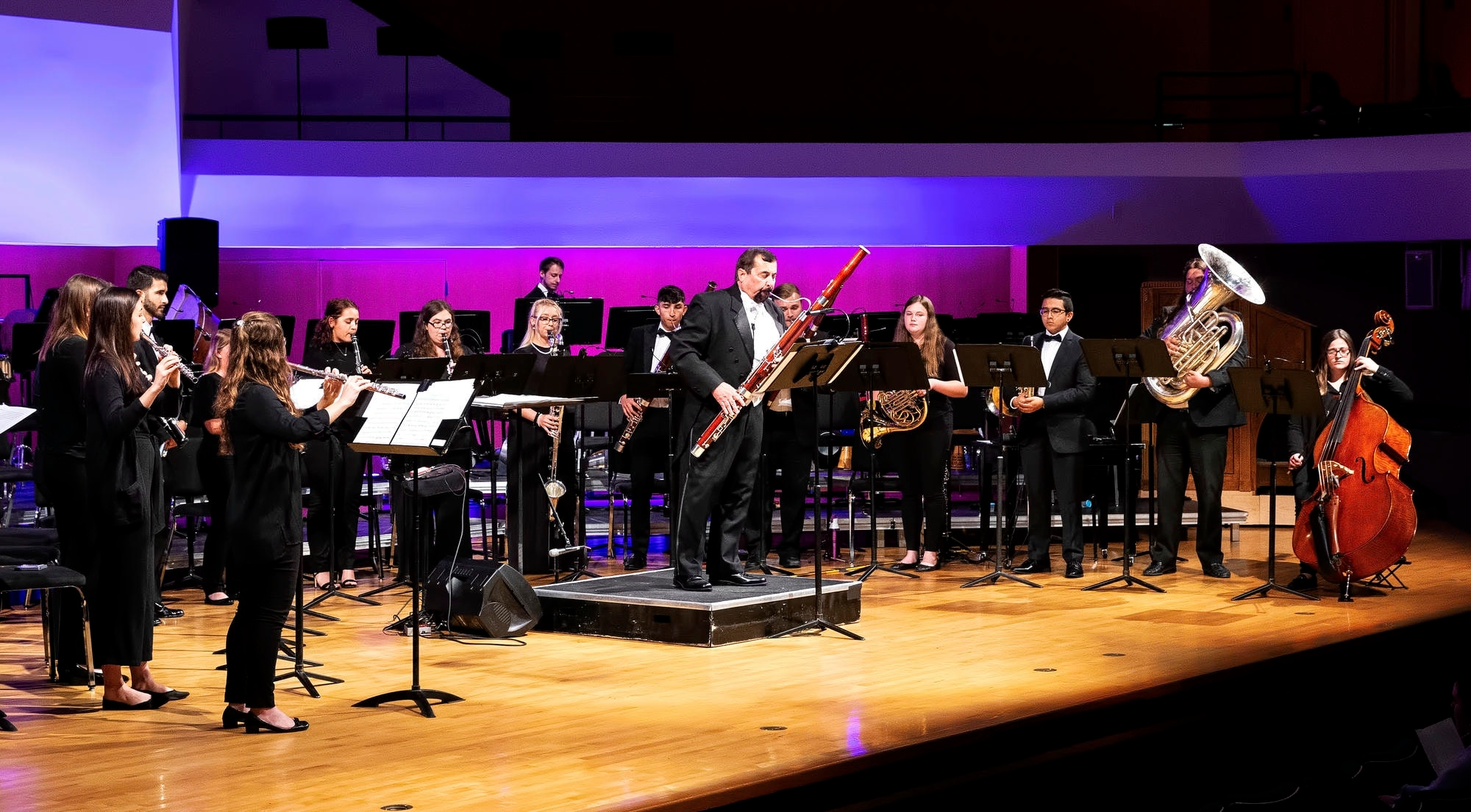 Prof. Rod Ackmann performs solo with members of the OU Wind Symphony in Sharp Hall.