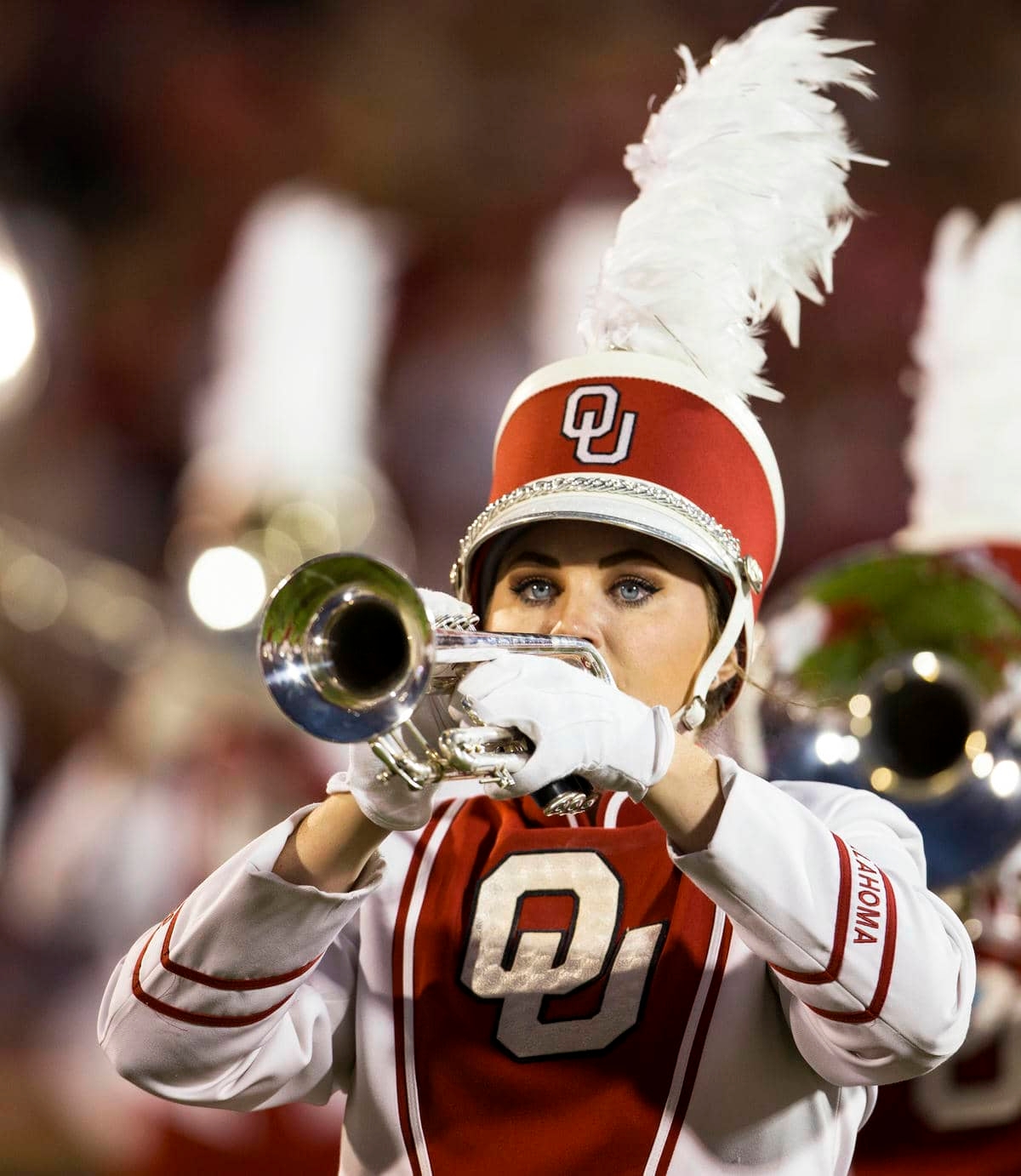 Pride of Oklahoma trumpet member performing halftime.