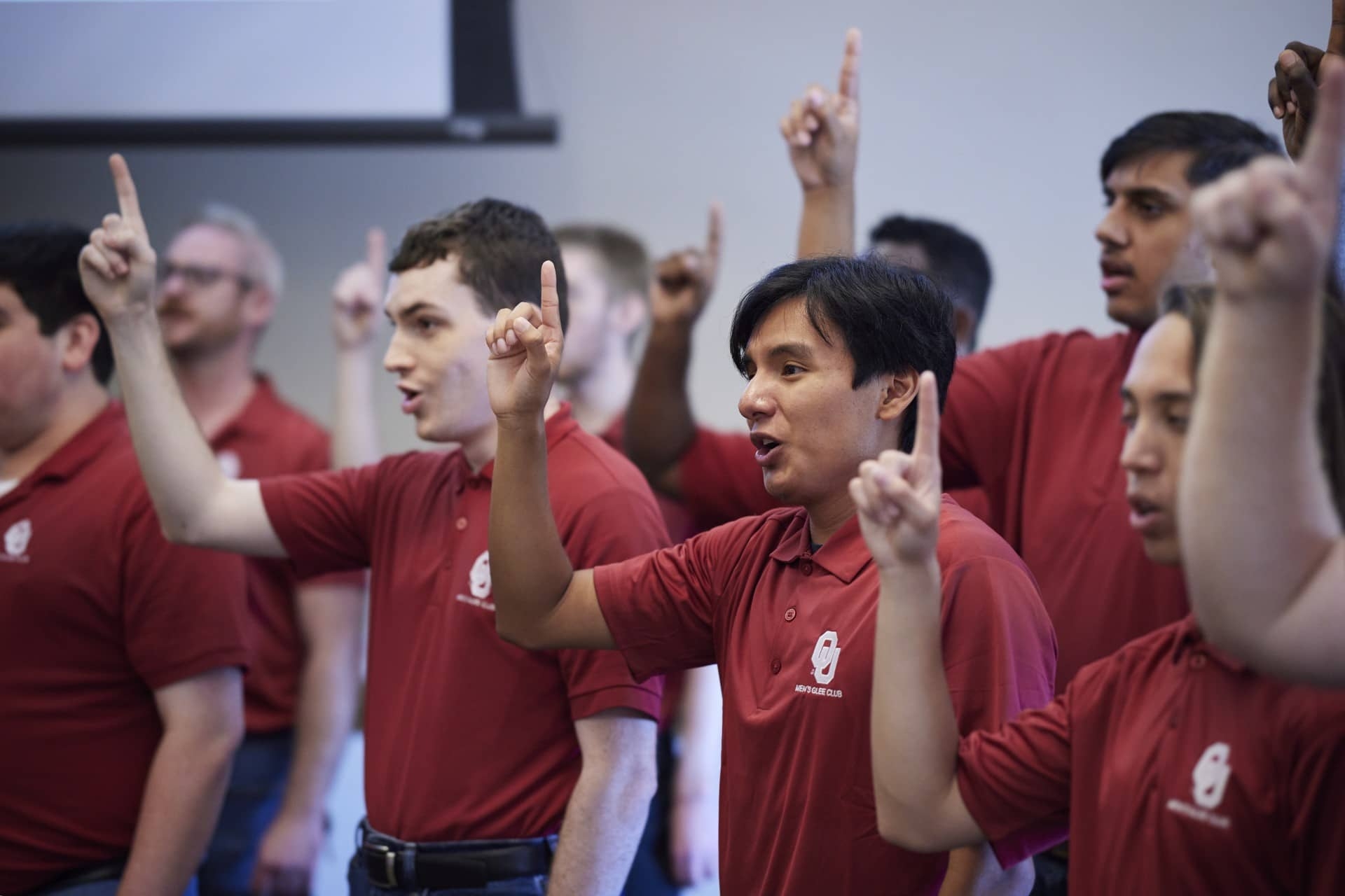 Glee Club rehearses in the choir room before pep rally.