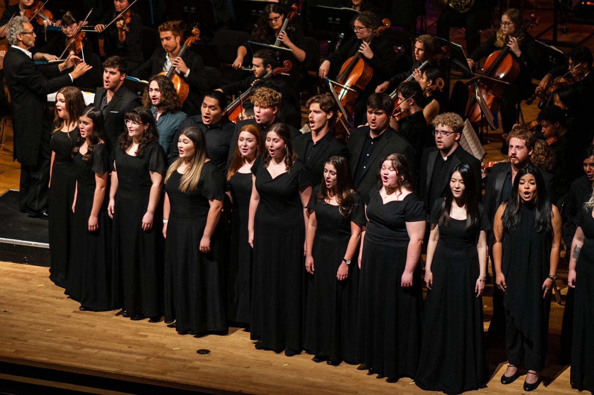 University Chorale performing with OU Symphony Orchestra in Sharp Hall.