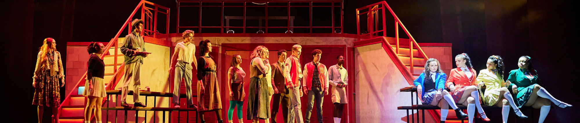 Cast of Heathers on stage.