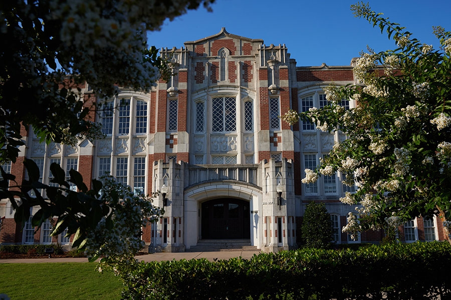 The entrance to Carpenter Hall with a blue sky in the background.
