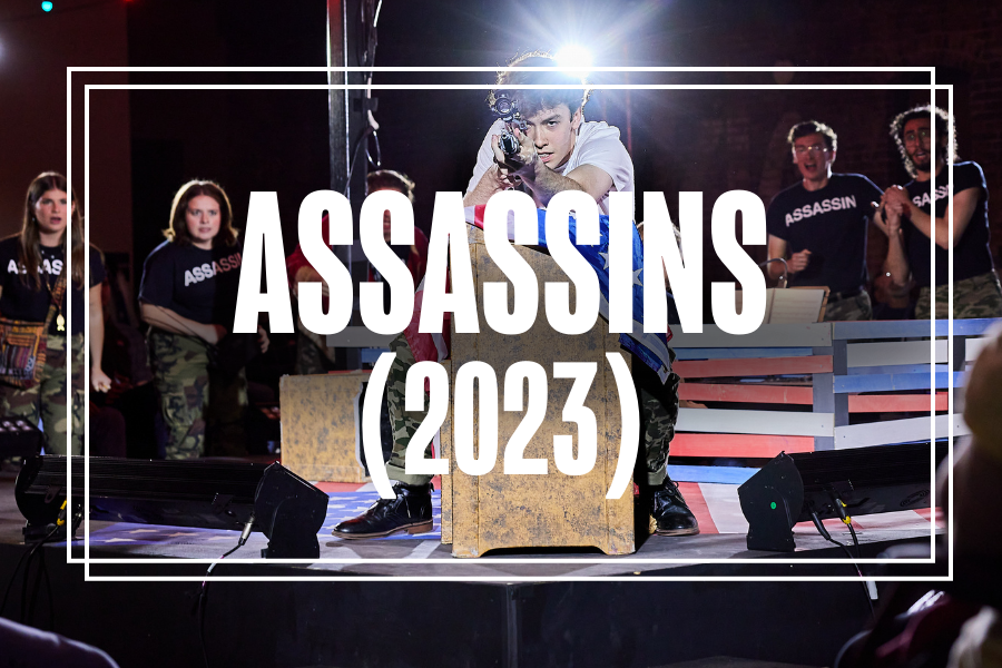 "Assassins (2023)" in white text overlaying a photo of Musical Theatre students performing.