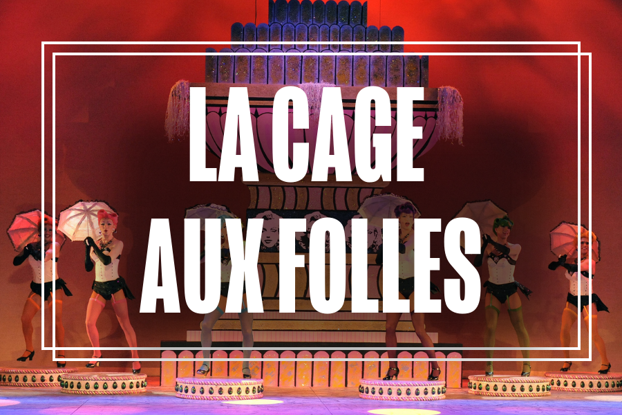 "La Cage Aux Folles" in white text overlaying a photo of Musical Theatre students performing.