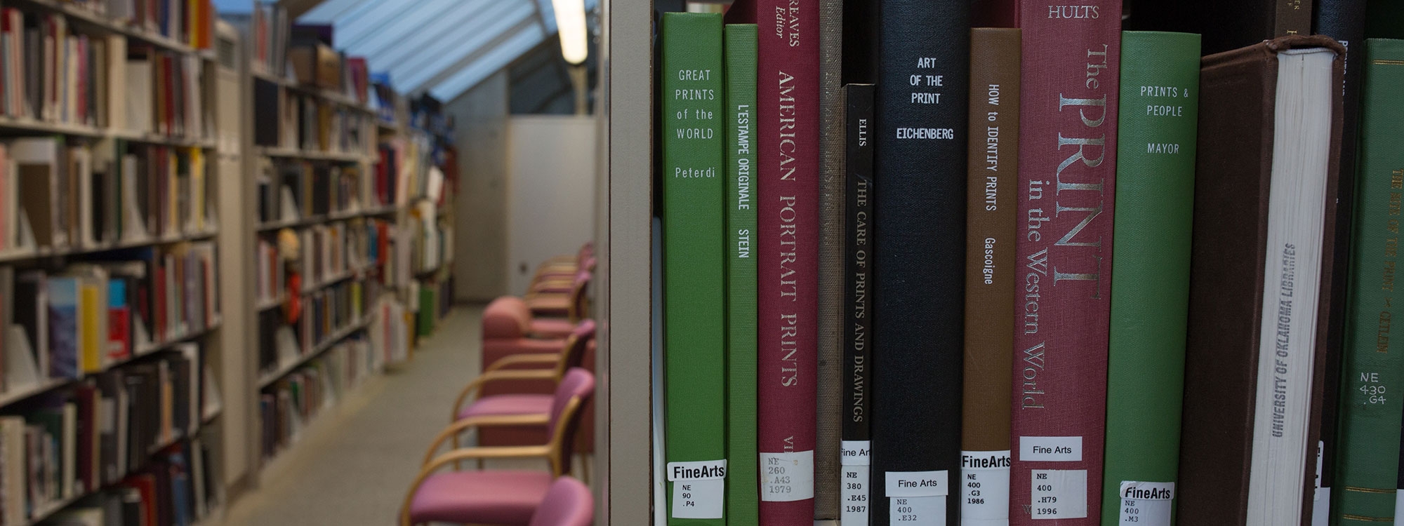 Books on shelves in the OU Fine Arts Library.