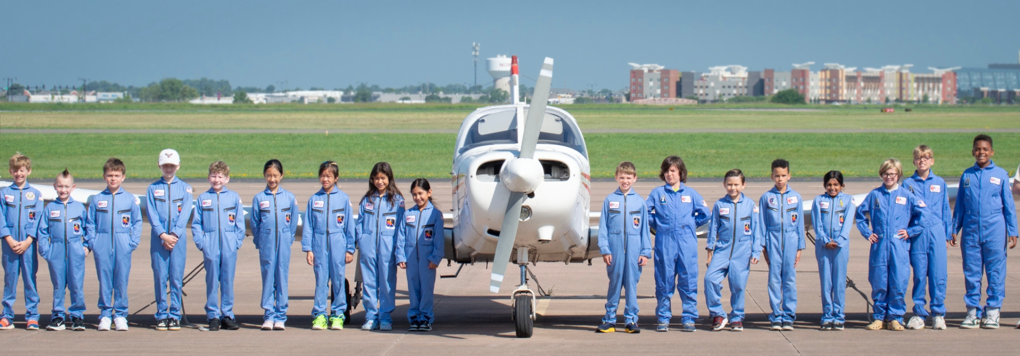 A group of children participate in a discovery flight
