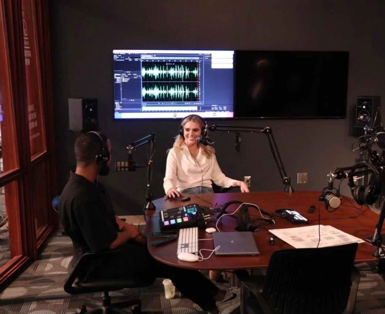 Libbey Dean in podcast studio.