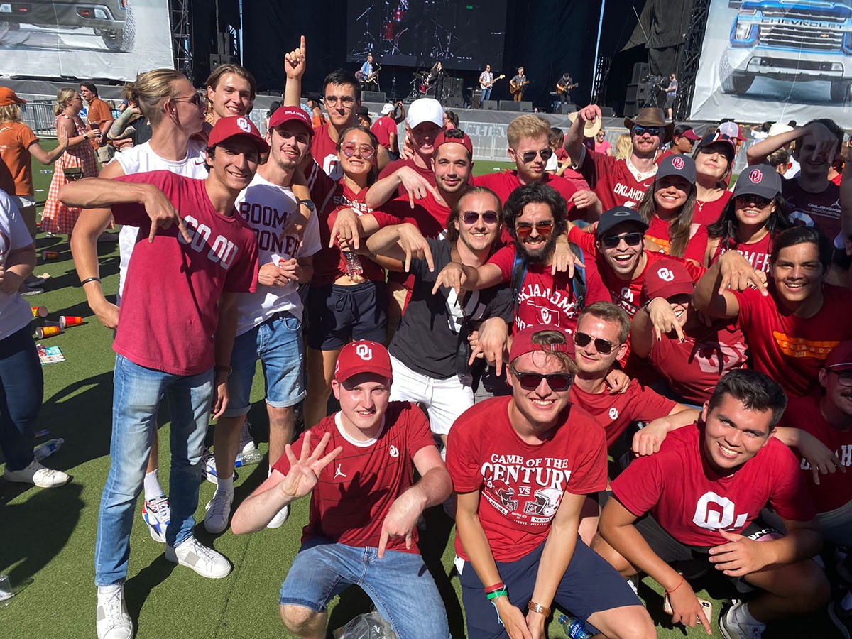 Harry and Adam with group of OU fans before OU-Texas game.