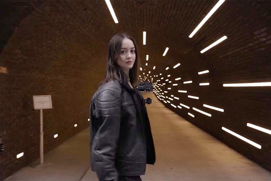 Lara Sei-Bee Park standing in a tunnel.