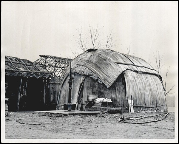 KICKAPOO INDIAN VILLAGE NEAR JONES: UNKNOWN: Caption reads, In winter the Kickapoo Indians live in the wickiup, the oval-shaped house made of woven reed mats.  Photographer UNKNOWN. Original Photo UNKNOWN. Published on O-2-17-63.