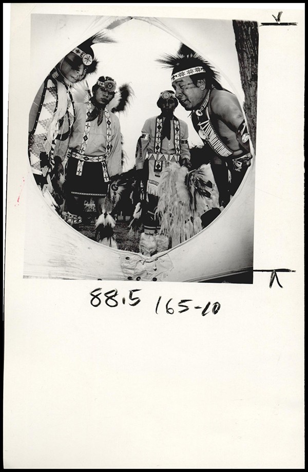 FAIR \ STATE \ INDIAN VILLAGE: UNKNOWN: Caption reads, Heap big show for State Fair of Oklahoma visitors is what these Kickapoo Indian dancers, peeking through their teepee entrance, provide. Photographer UNKNOWN. Original Photo 09/28/1970. Published on T-9-28-70.