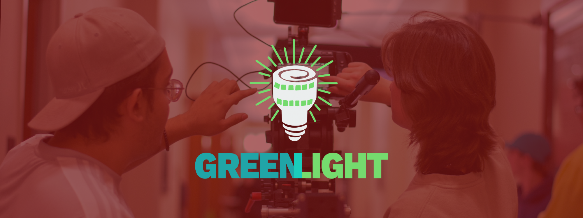 Greenlight Production logo overlaying production photo. 