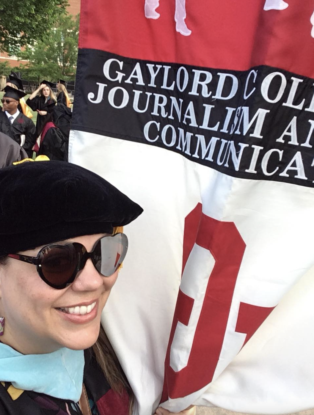 Melanie Wilderman with Gaylord Banner