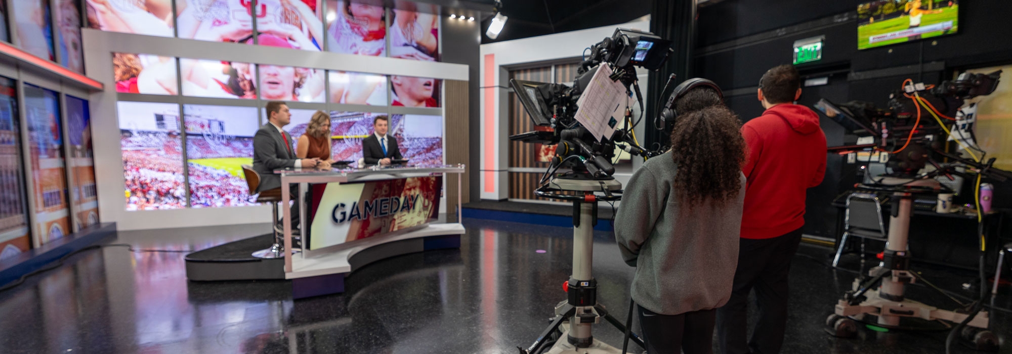 Students working on the set of Gameday U.