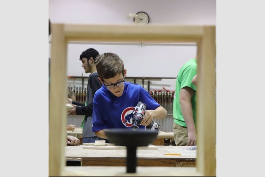 A leadership camp participant in the Creating Making lab.