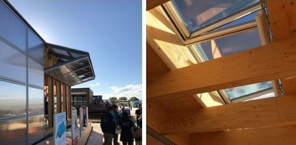 A building exterior and interior featuring windows and skylights.