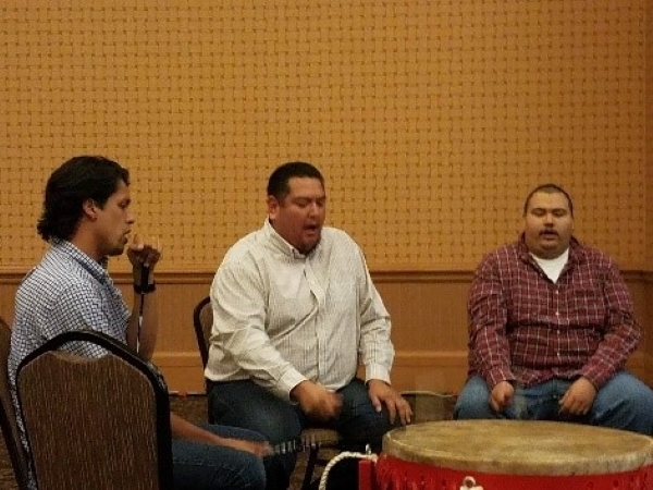 Sigma Nu Alpha Gamma group drumming.