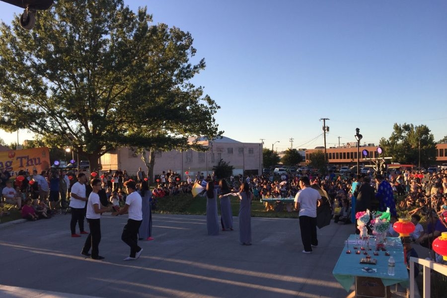 People using a military park in the evening with the sun setting