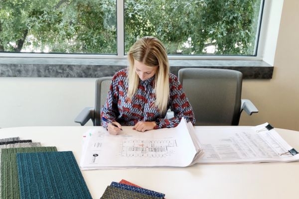 Candid photo of Ryan McNitt sitting at a desk