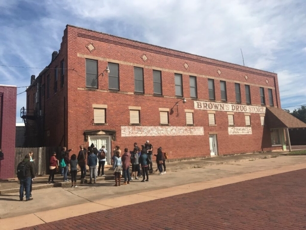Students touring historic buildings.