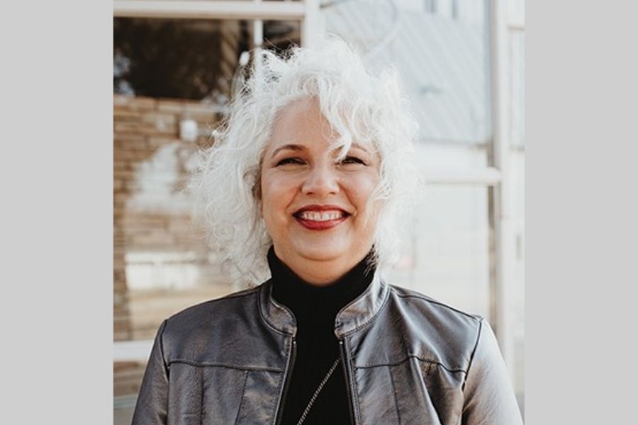 The late Lynne Rostochil standing for a portrait