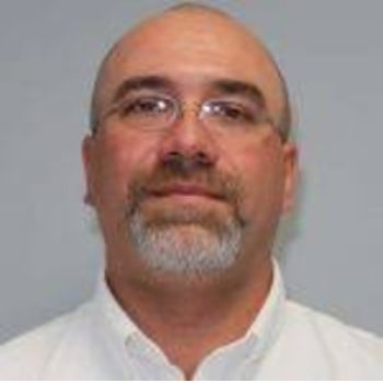 Headshot of Andrew Rowley.