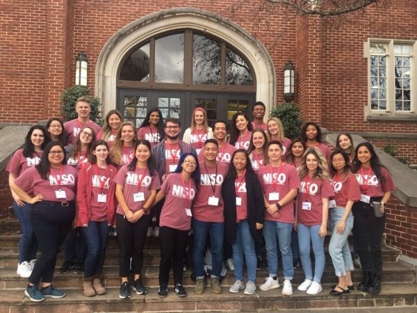 Students in N I S O shirts.